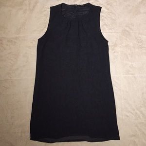 Black high-neck sleeveless dress